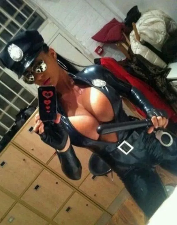 Picture of Sexy female cop with massive weapons