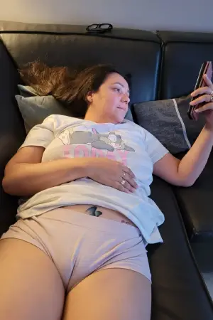 A picture of Amateur babe laying on sofa pink panties cameltoe  hosted on ShaveKings.com published Saturday April 4th