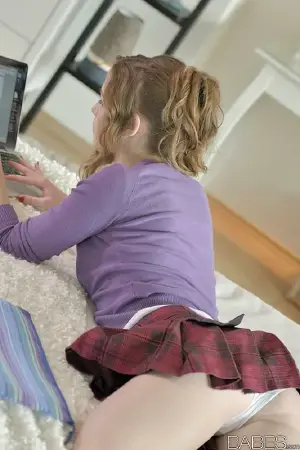 View image eighteen year old on laptop flashing upskirt